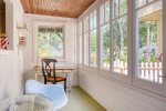 This sun porch also has a work area